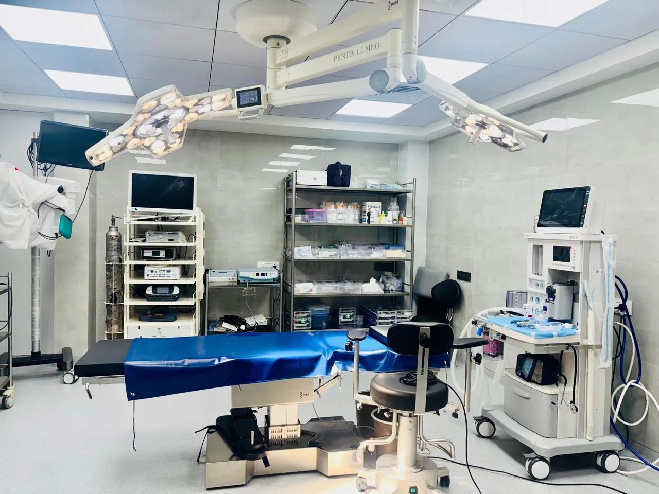 Modular operation theatre with overhead surgical lights at Agastya Hospitals, Ballari